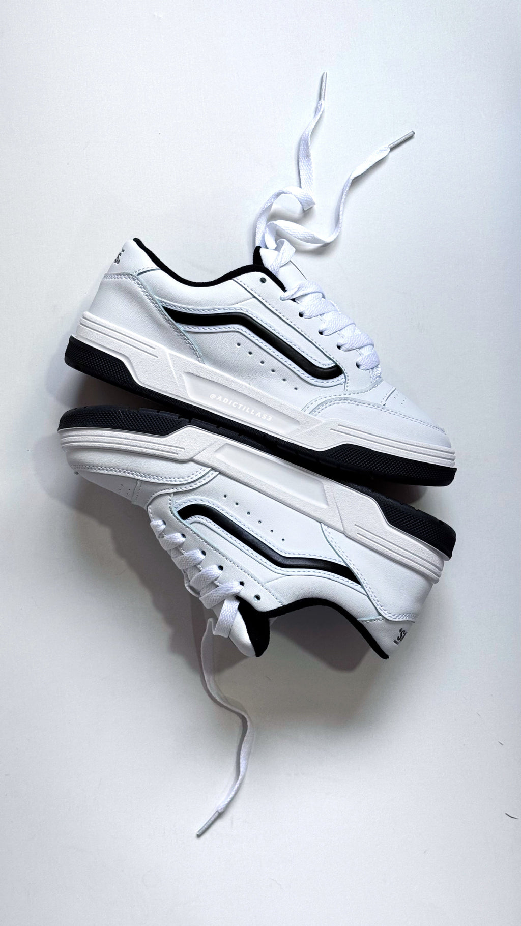 vans hylane blanca Negra